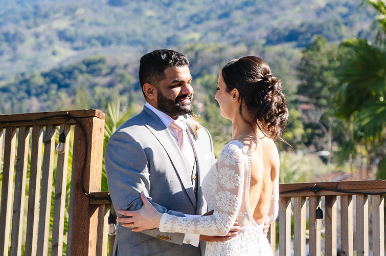 Bride and groom embracing, generic background