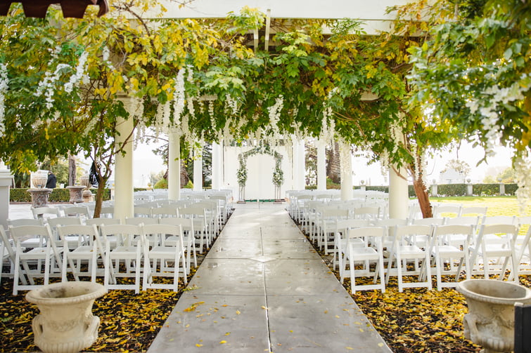 Ceremony site with gorgeous wisteria - Jefferson Street Mansion by Wedgewood Weddings