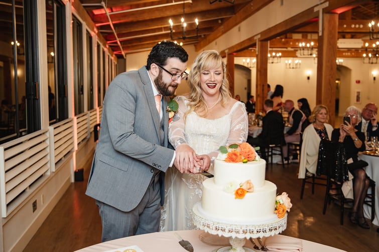 Couple cutting their wedding cake - Carmel Fields by Wedgewood Weddings