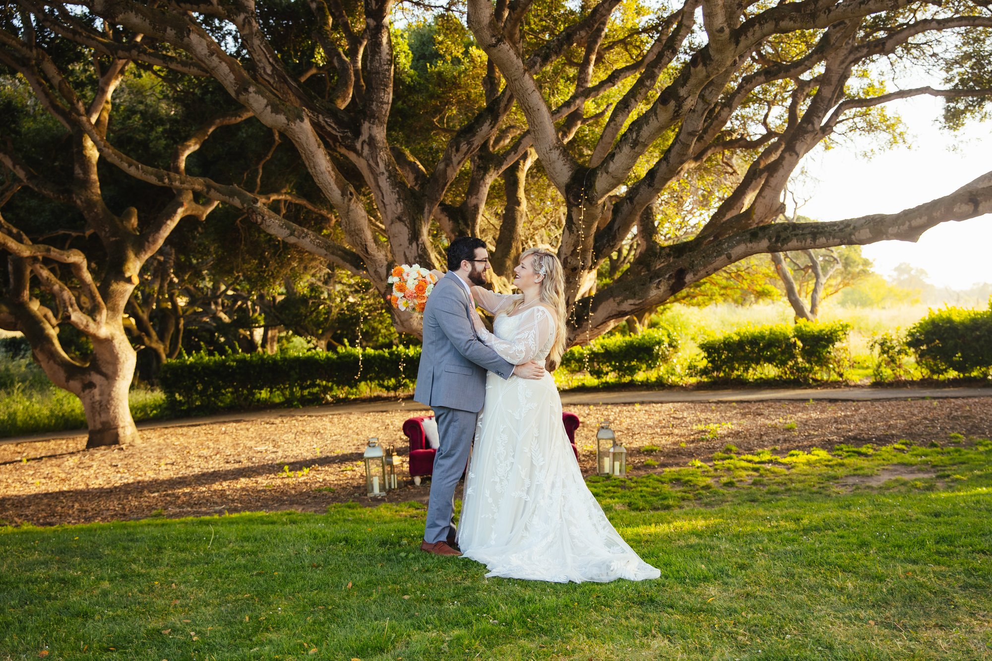 Couple embracing under beautiful tree - Carmel Fields by Wedgewood Weddings