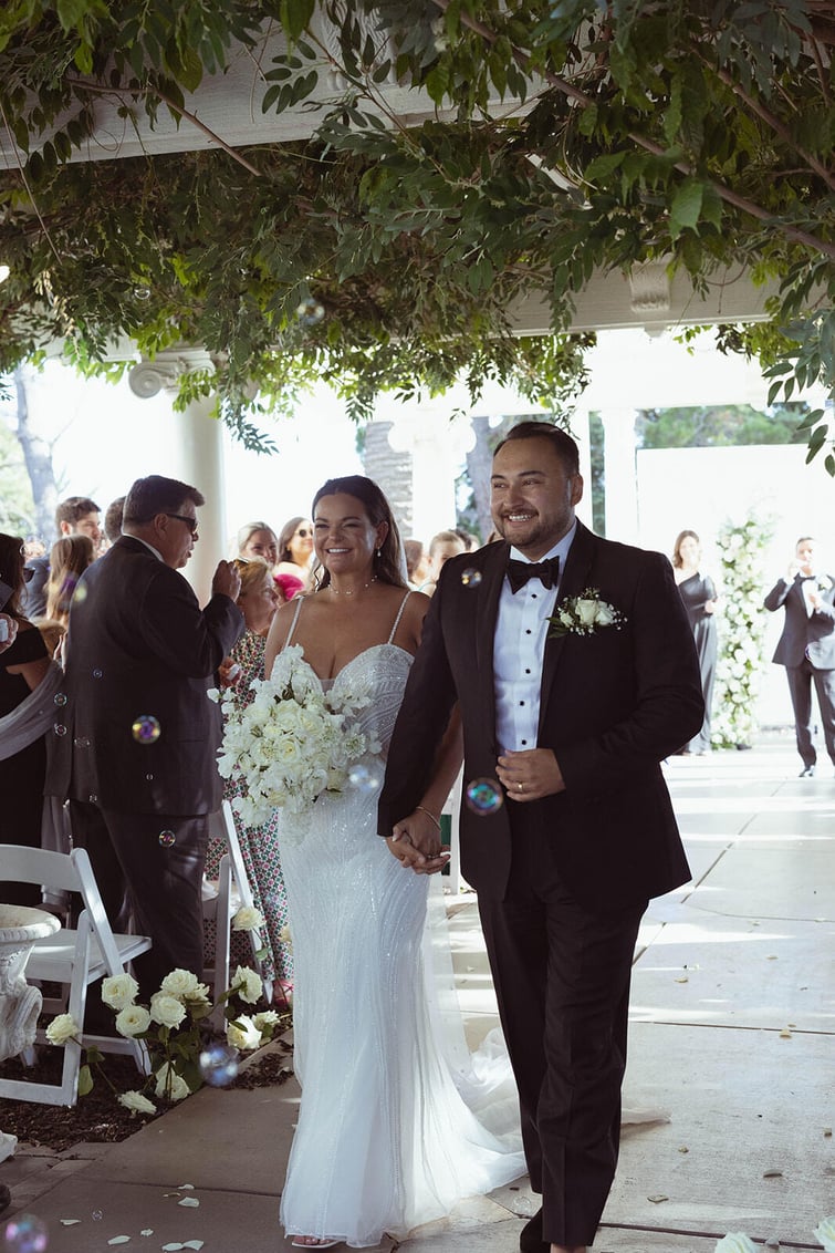 Couples recessional at - Jefferson Street Mansion by Wedgewood Weddings