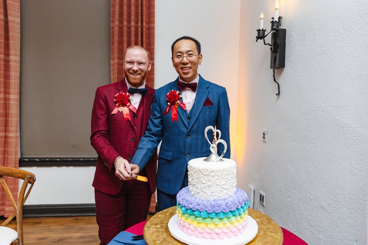 Happy couple cutting their cake - Officers Club at the Presidio