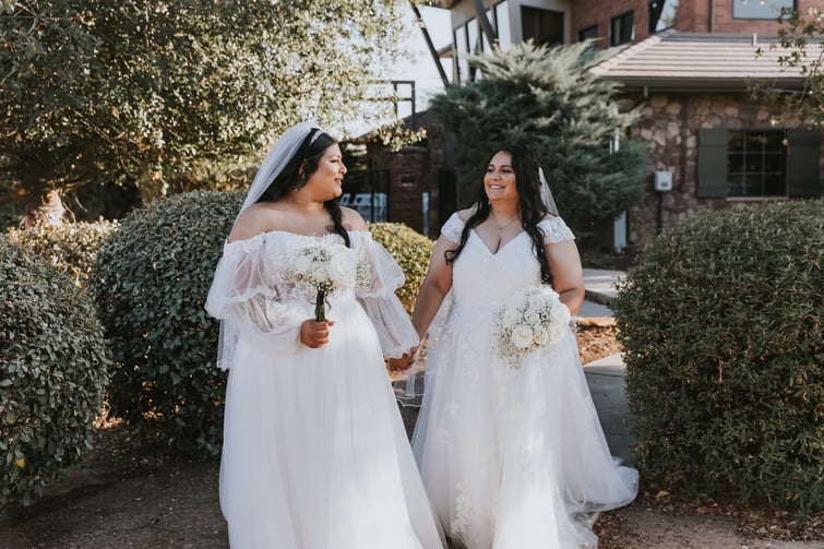 Newlyweds outside Evergreen Springs by Wedgewood Weddings