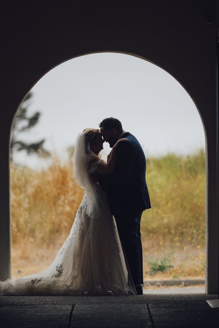 Photo op in doorway at Carmel Fields by Wedgewood Weddings