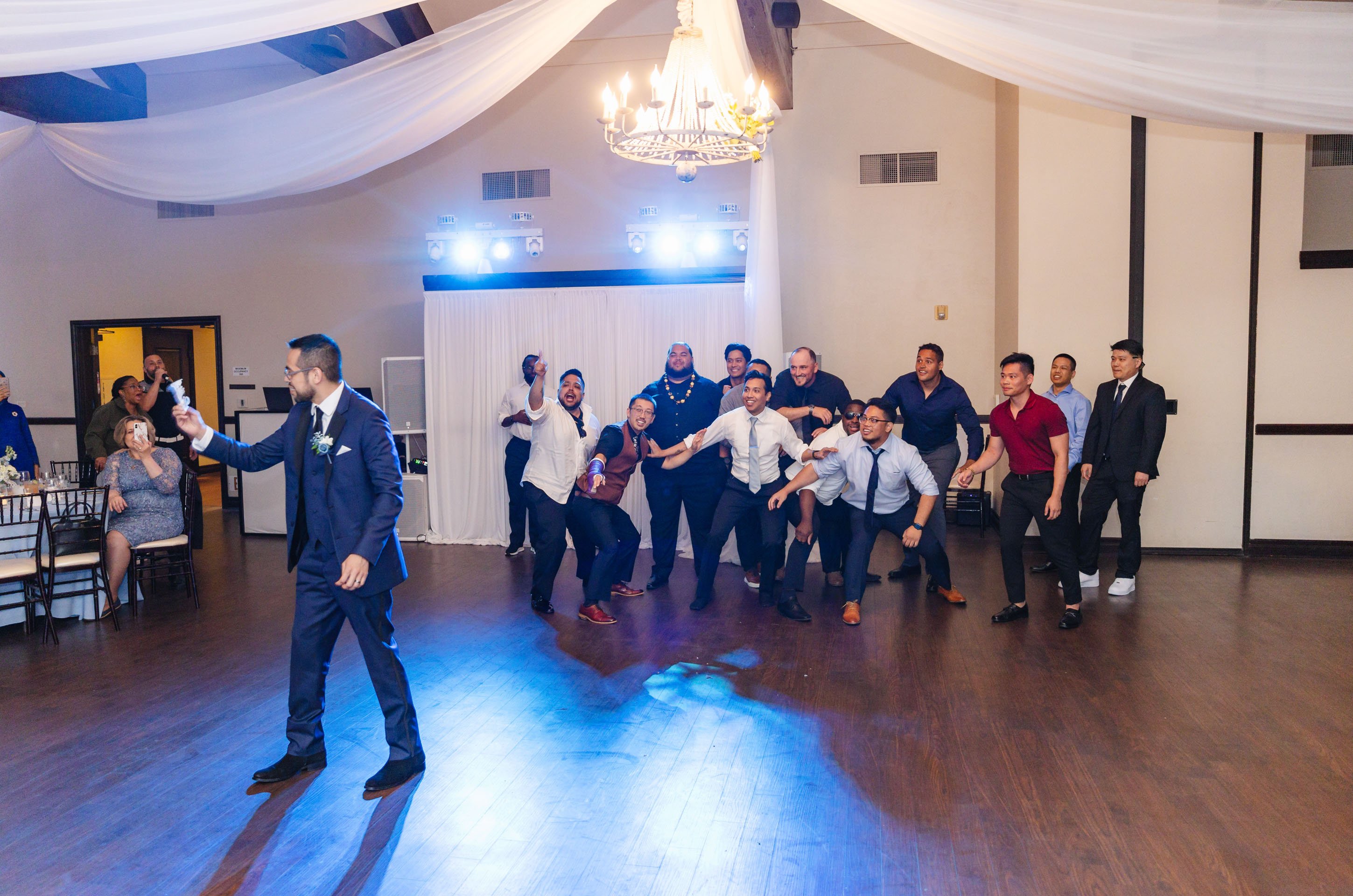 Start of the Garter Toss at Stonetree Estate by Wedgewood Weddings