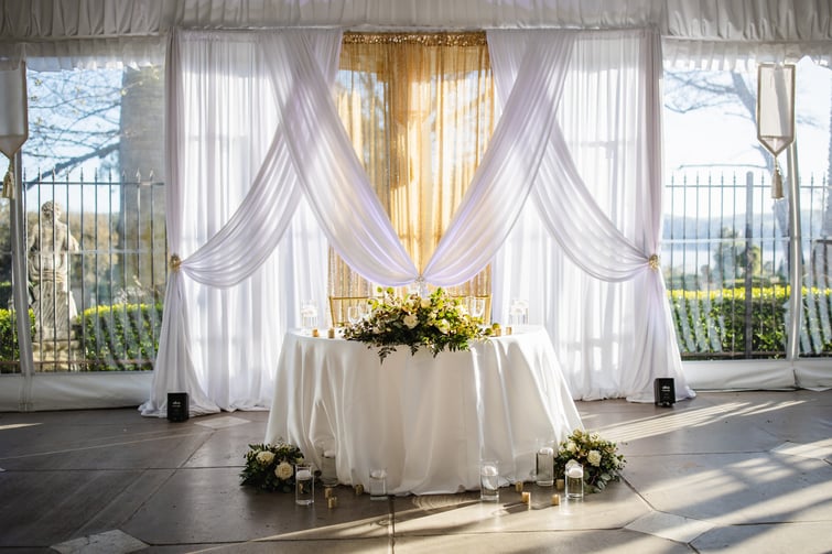 Sweetheart table with draping - Jefferson Street Mansion by Wedgewood Weddings