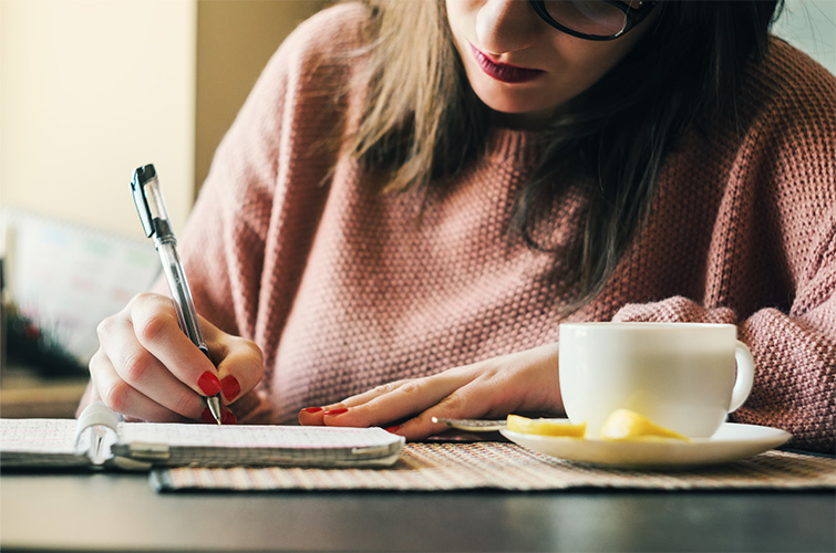 Woman filling out a card