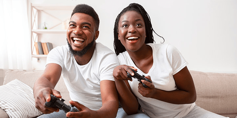 Couple playing video games together