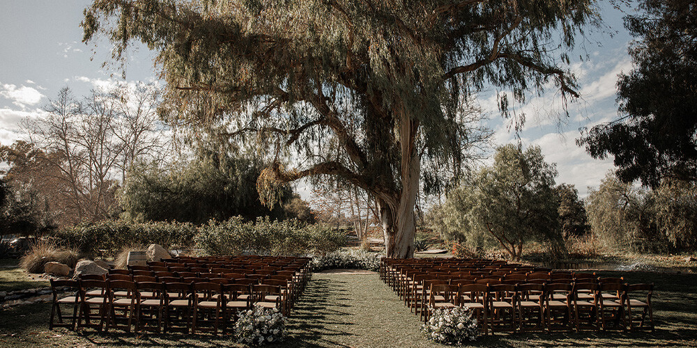 Ceremony site with beautiful florals at Galway Downs by Wedgewood Weddings in Temecula, CA