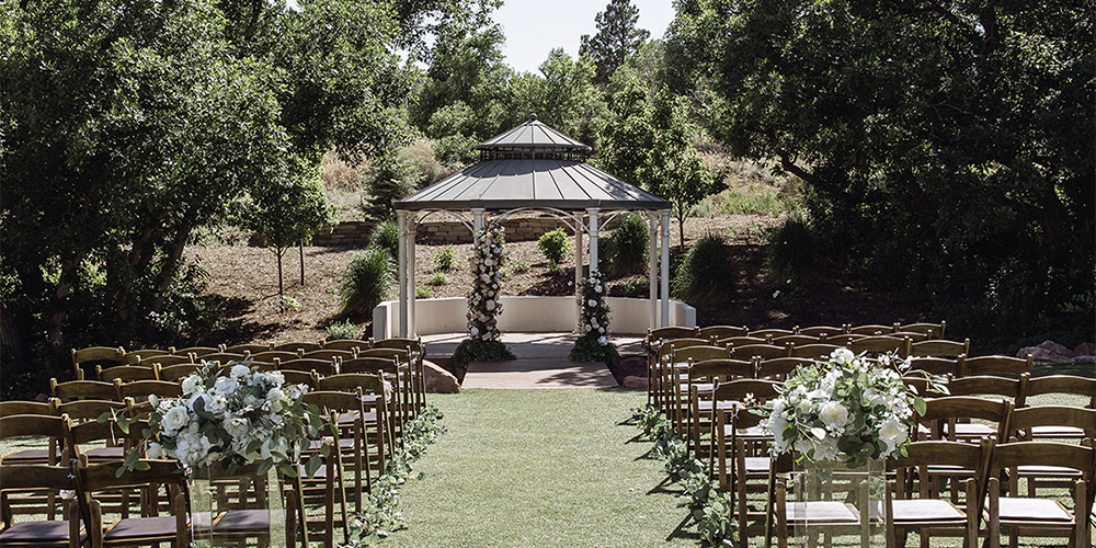 Garden ceremony site at Creekside Terrace by Wedgewood Weddings