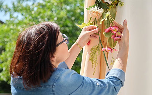 Florist setting up flowers outside