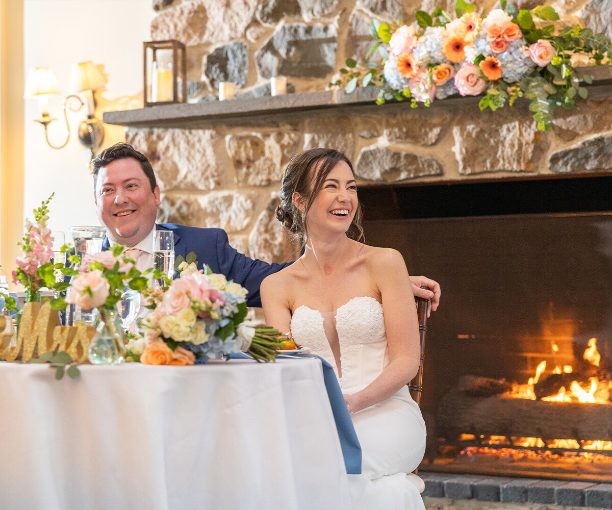 Couple by the cozy fire - Barker House by Wedgewood Weddings