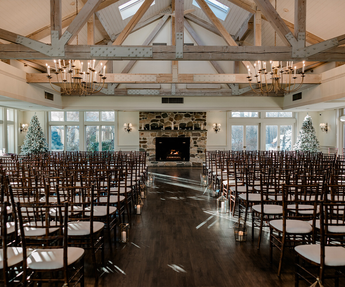 Indoor winter ceremony at Barker House by Wedgewood Weddings