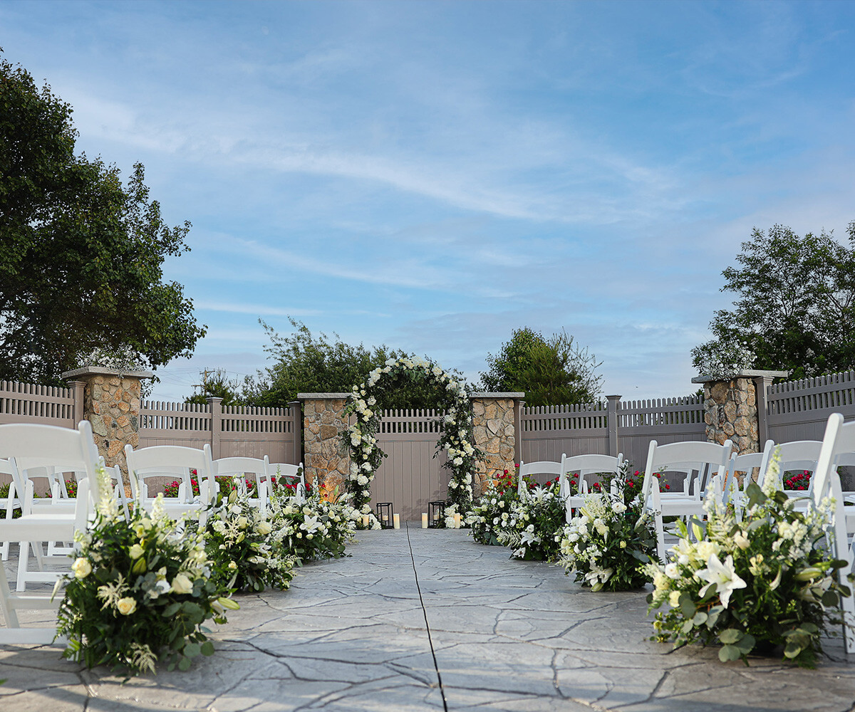 Outdoor ceremony with floral - Barker House by Wedgewood Weddings