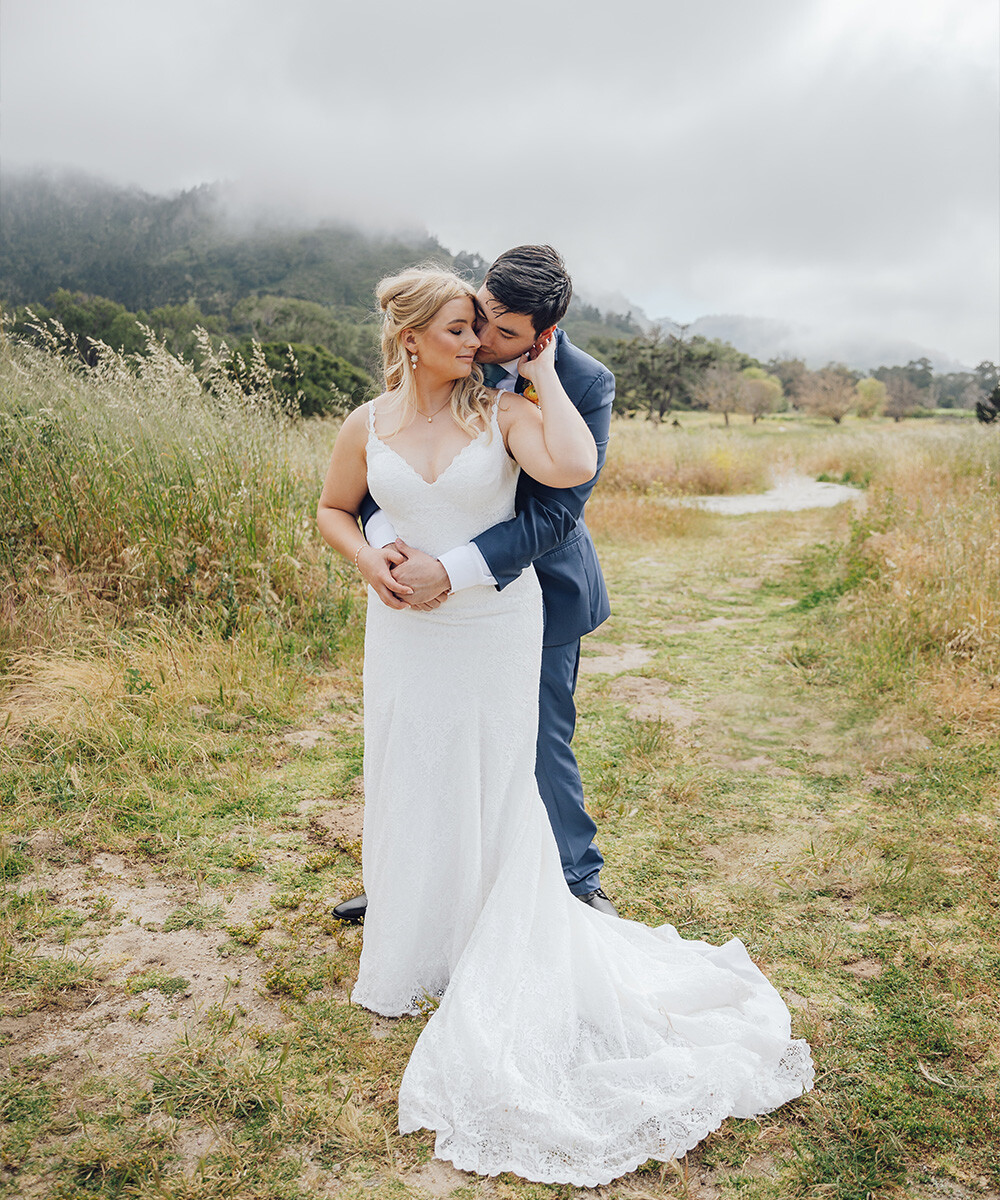 Couple embracing in beautiful park - Carmel Fields by Wedgewood Weddings