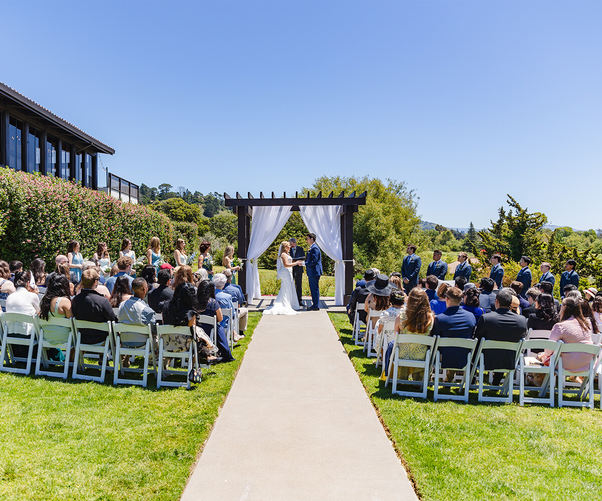 Garden arch ceremony at Carmel Fields by Wedgewood Weddings