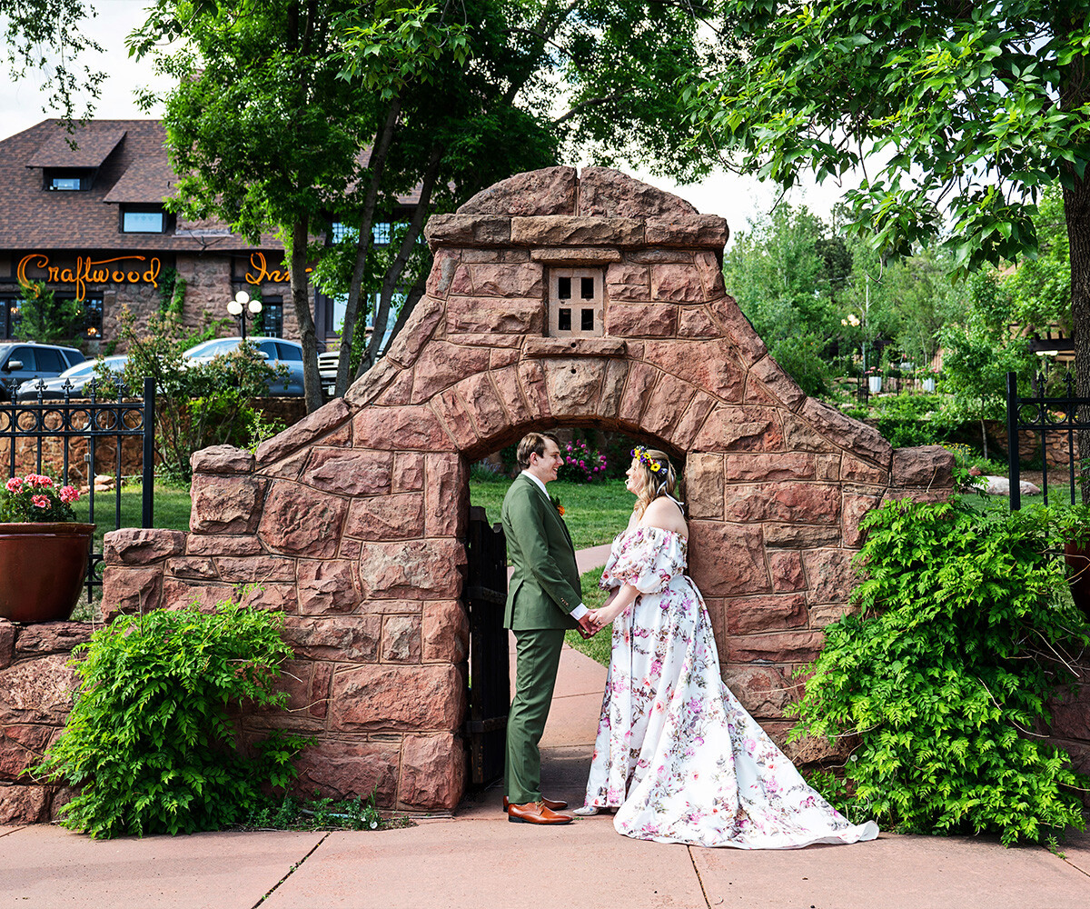 Couple in front of entryway - Craftwood Peak by Wedgewood Weddings