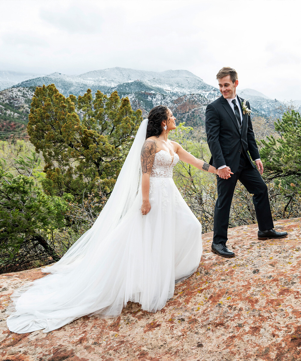 Couple with snow on the mountains - Craftwood Peak by Wedgewood Weddings