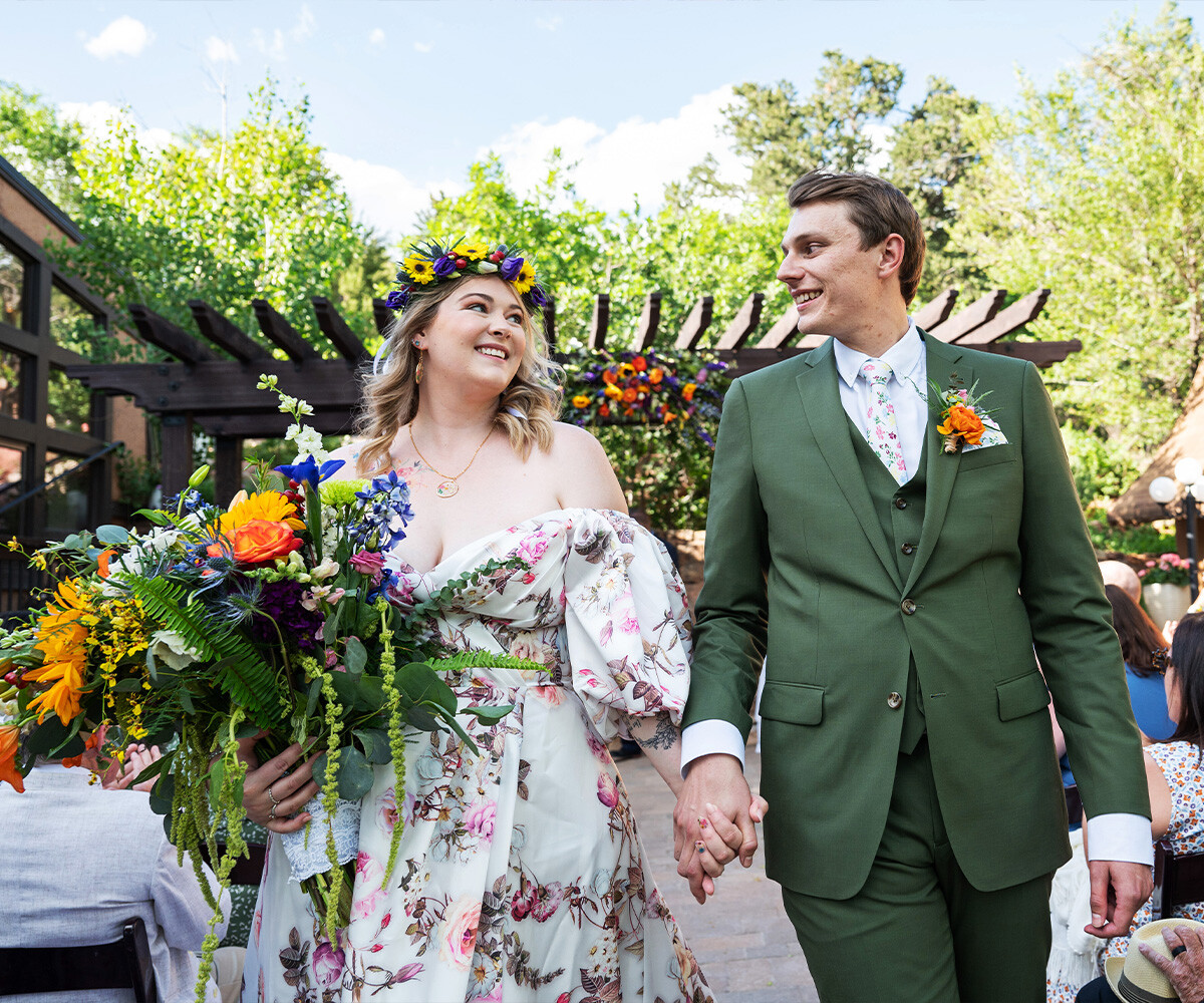 Happy couple walking down the aisle - Craftwood Peak by Wedgewood Weddings