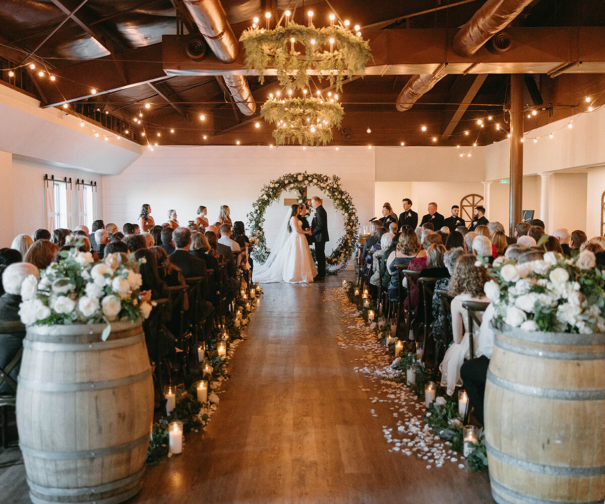 Couple during ceremony in The Loft - Creekside Terrace by Wedgewood Weddings