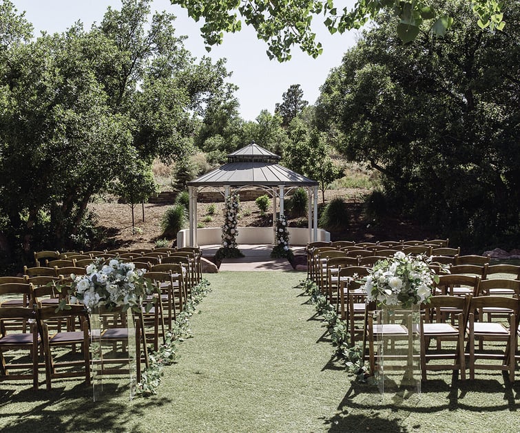 Garden gazebo ceremony with florals - Creekside Terrace by Wedgewood Weddings