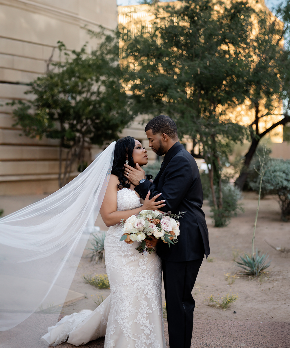 Couple in front of greenery - Croft Downtown by Wedgewood Weddings