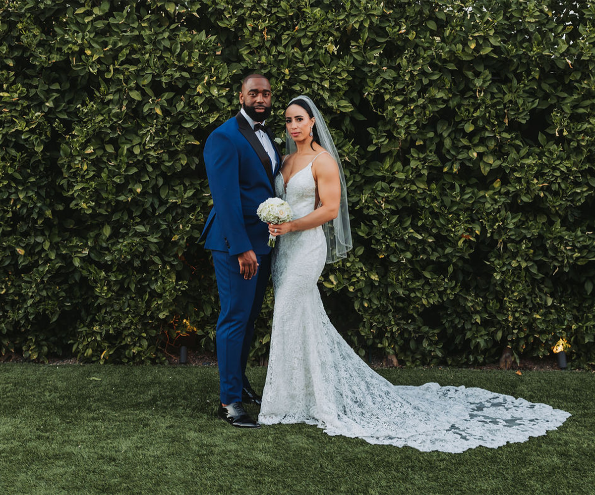 Couple in front of ivy wall at Croft Downtown by Wedgewood Weddings