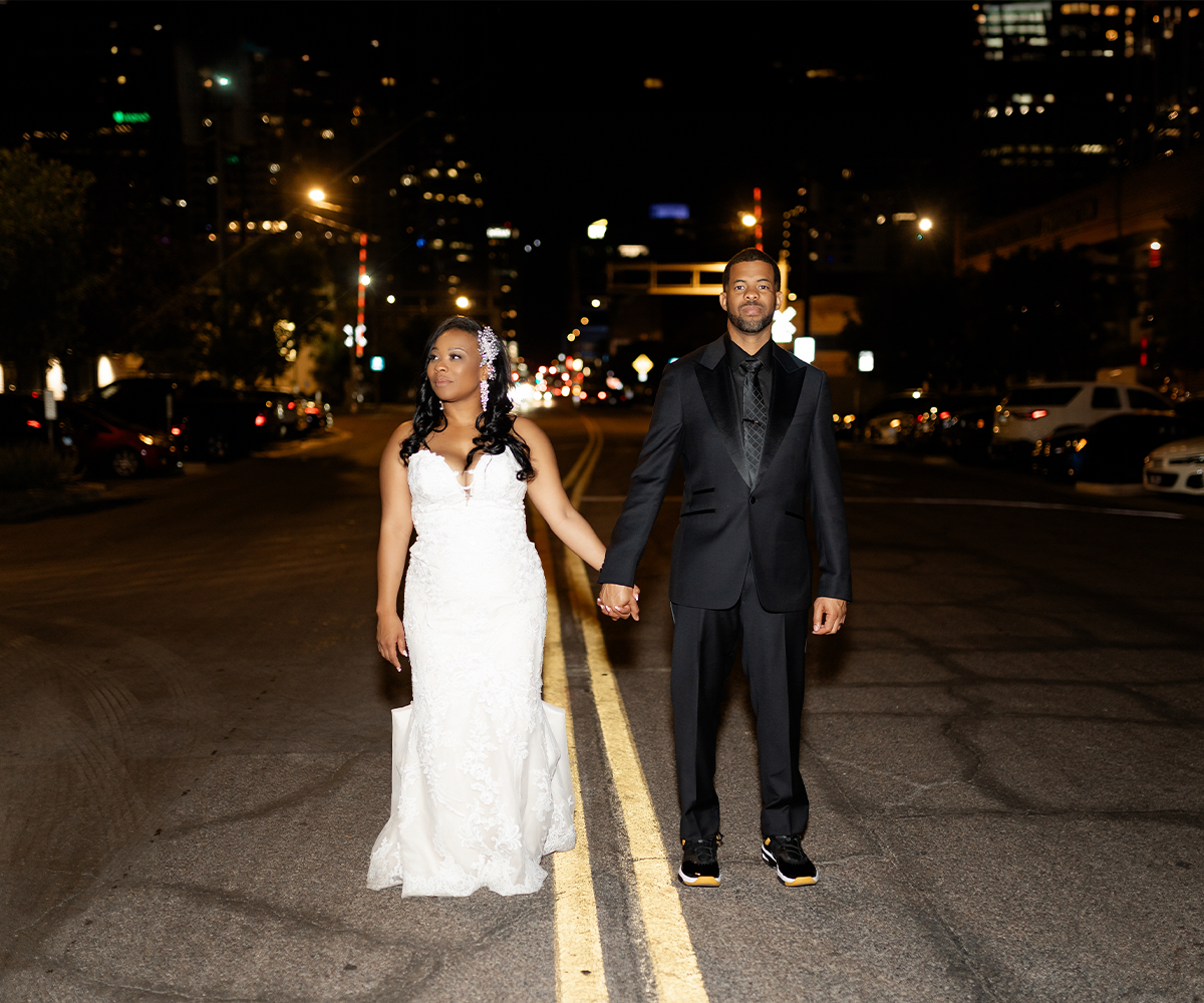 Couple posing at nighttime in downtown Phoenix - Croft Downtown by Wedgewood Weddings