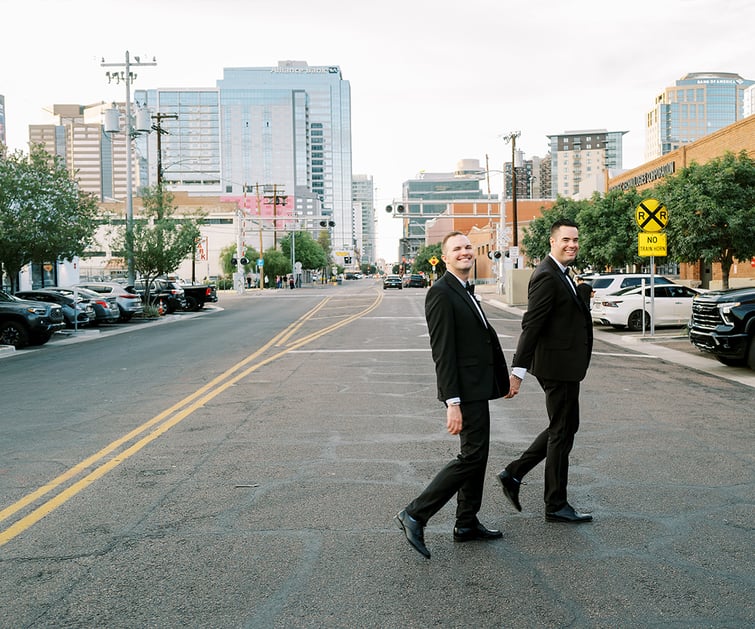 Grooms walking through downtown Phoenix - Croft Downtown by Wedgewood Weddings