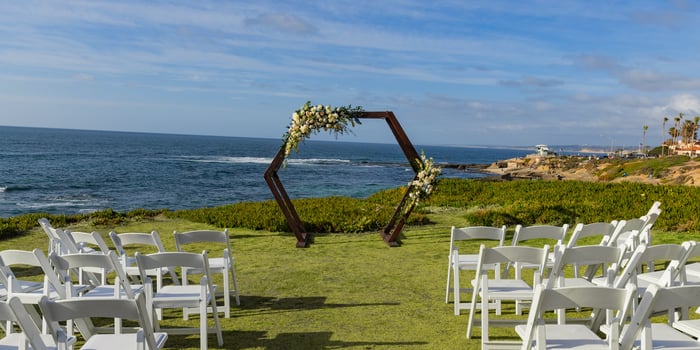 Beach side ceremony at Cuvier Club by Wedgewood Weddings