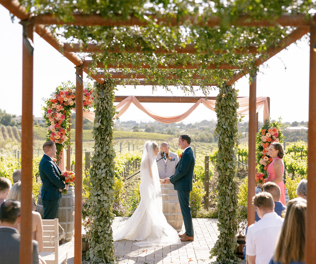 Ceremony site with greenery - Danza del Sol Winery by Wedgewood Weddings