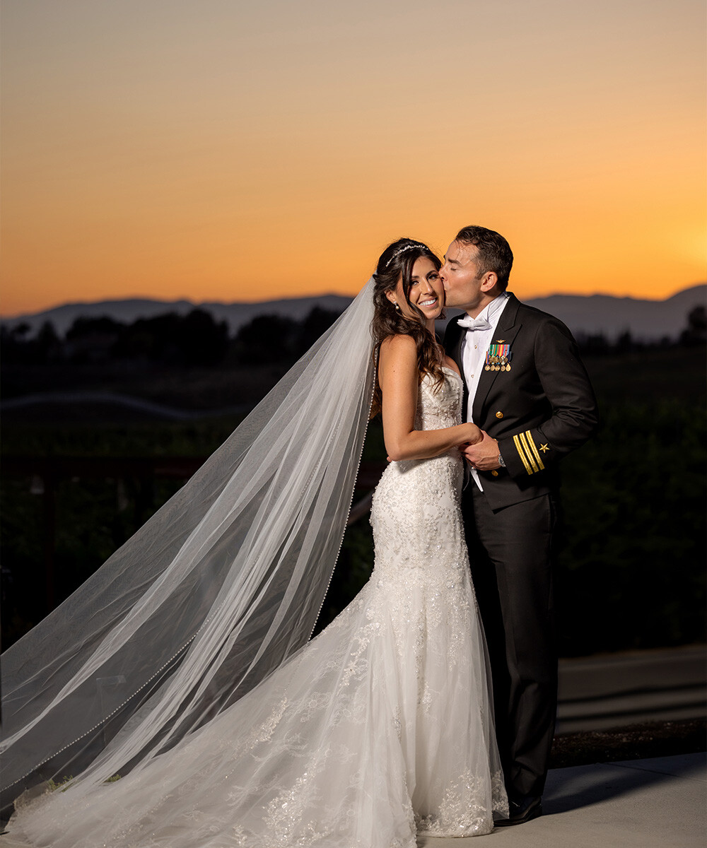 Couple in front of beautiful sunset - Danza del Sol Winery by Wedgewood Weddings