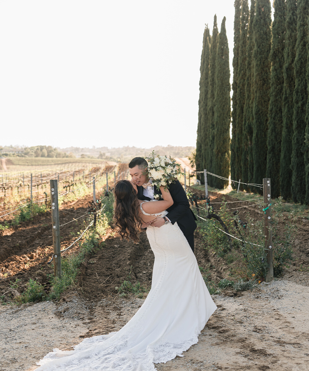 Happy couple at Danza del Sol Winery by Wedgewood Weddings