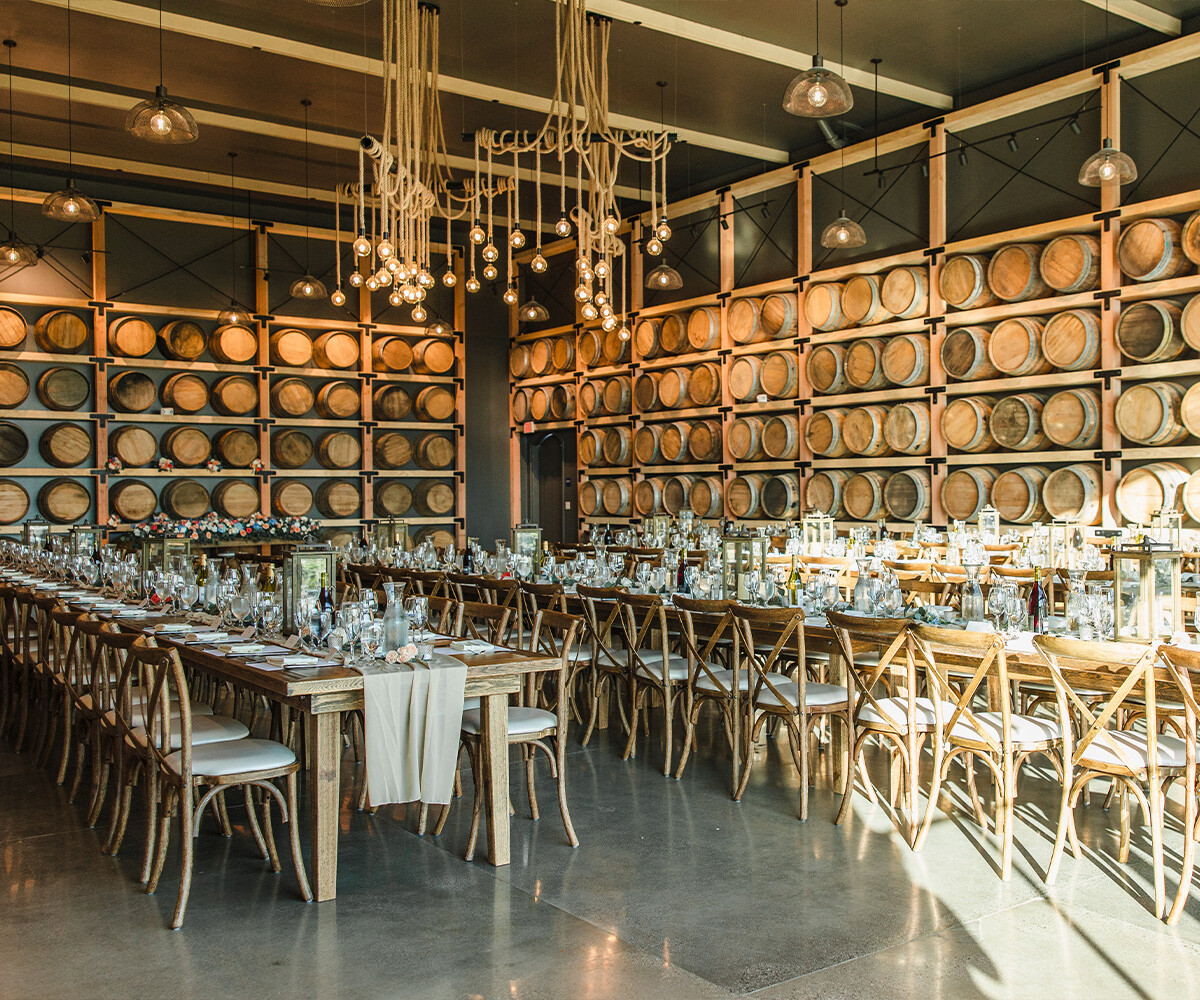 Incredible Barrel Room Reception Setup at Danza del Sol Winery by Wedgewood Weddings