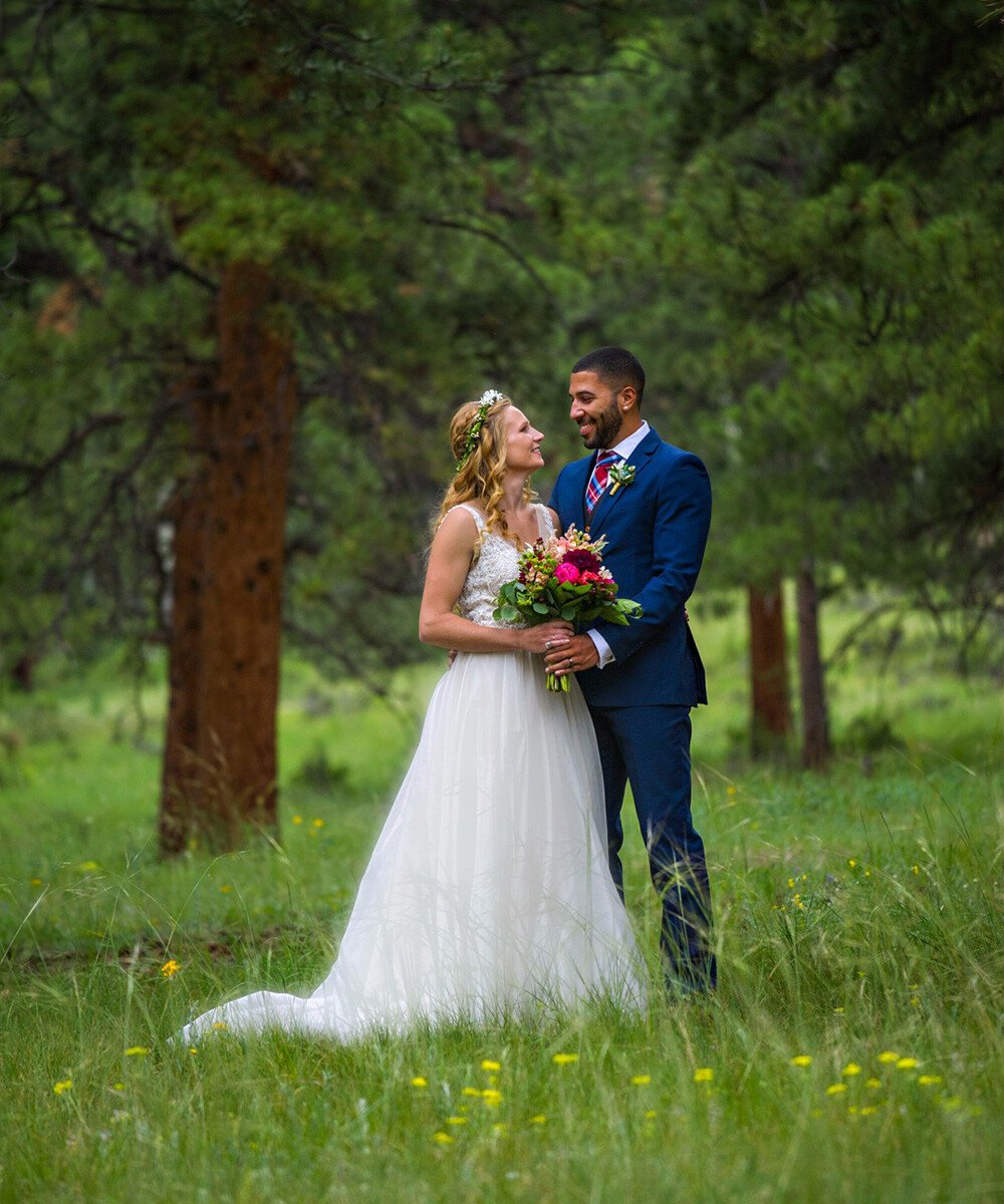 Couple in lush meadow - Della Terra by Wedgewood Weddings