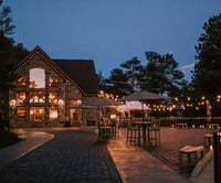 Gorgeous nighttime shot of the exterior at Della Terra by Wedgewood Weddings