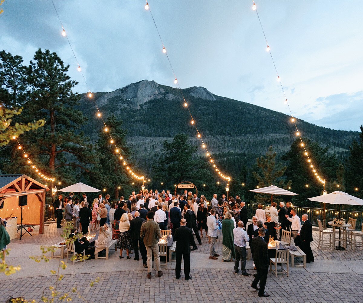 Guests enjoying cocktail hour with mountain views - Della Terra by Wedgewood Weddings