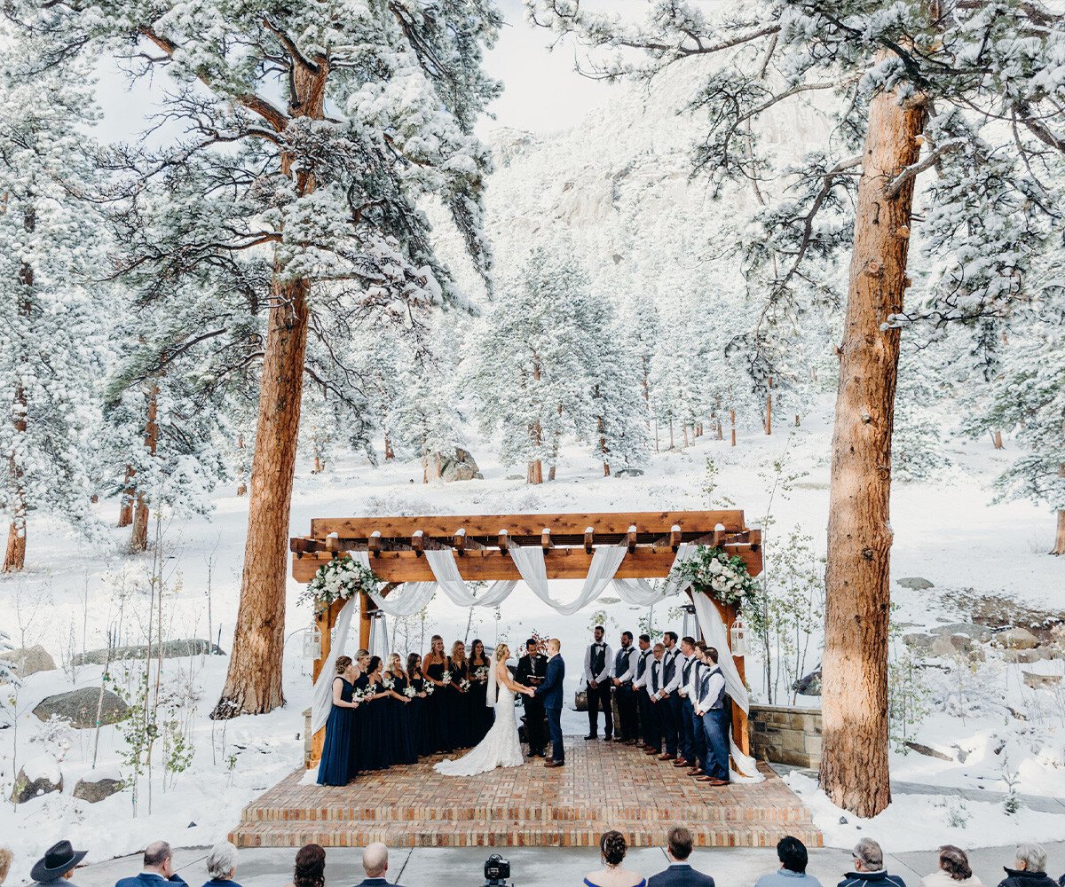 Outdoor ceremony in the snow - Della Terra by Wedgewood Weddings