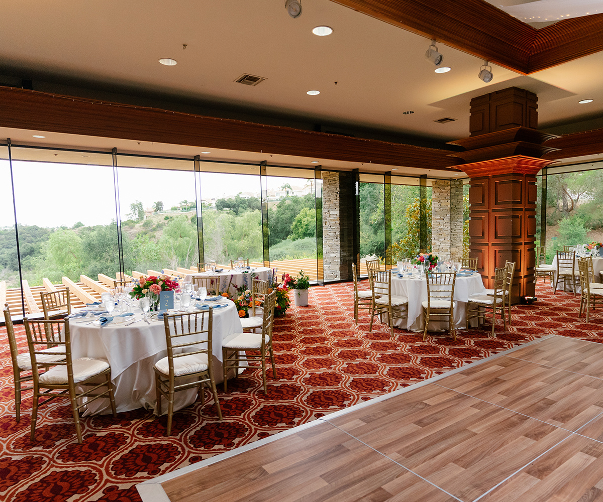 Indoor reception hall at Dove Canyon with large window and high ceilings (1)