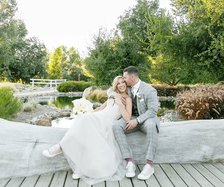 Couple by the pond at Galway Downs by Wedgewood Weddings