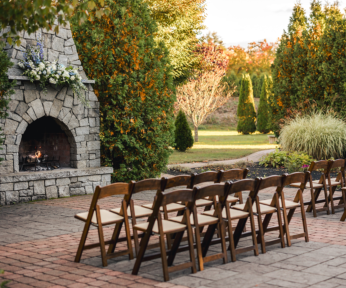 Fireplace ceremony setup during the fall - Groveland Fairways by Wedgewood Weddings