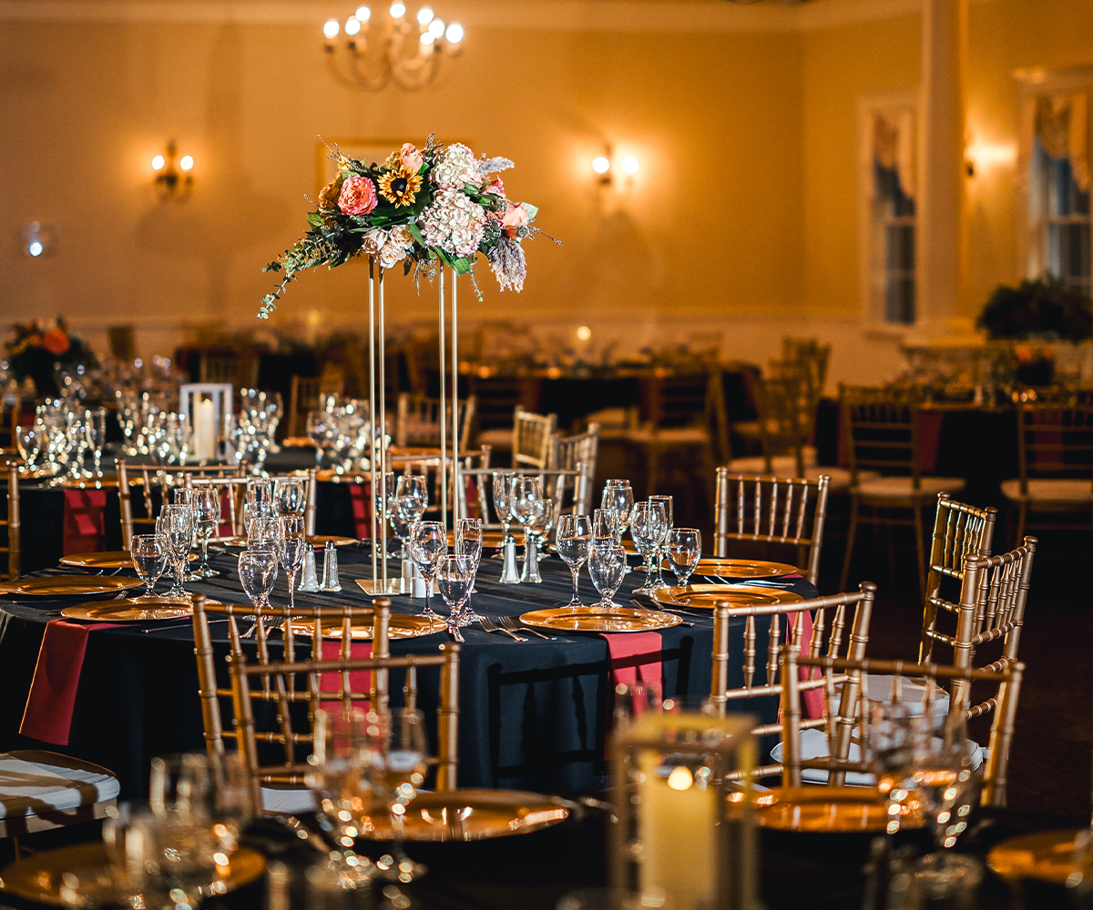 Reception details with floral centerpiece - Groveland Fairways by Wedgewood Weddings