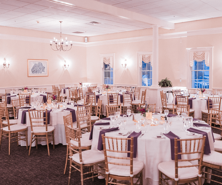 Reception setup with purple accents - Groveland Fairways by Wedgewood Weddings