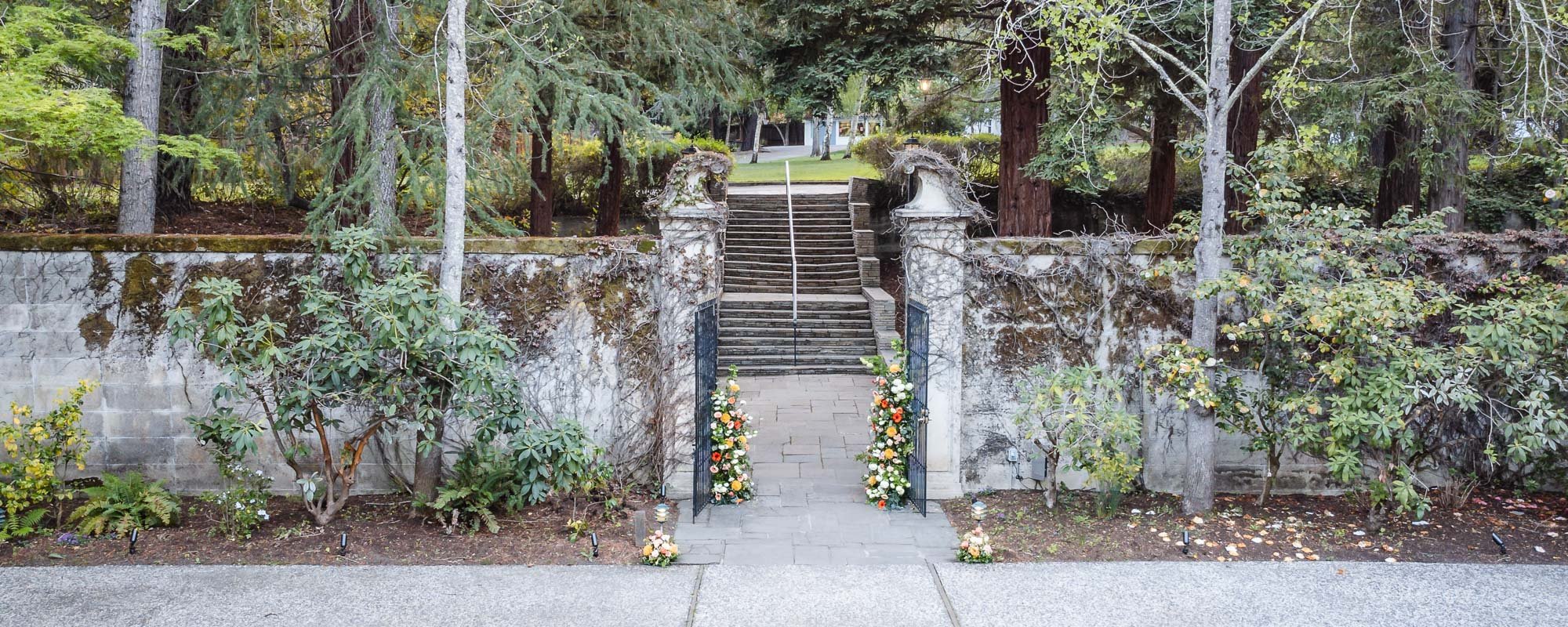 Hacienda da las Flores by Wedgewood Weddings - beautiful entry with greenery and floral