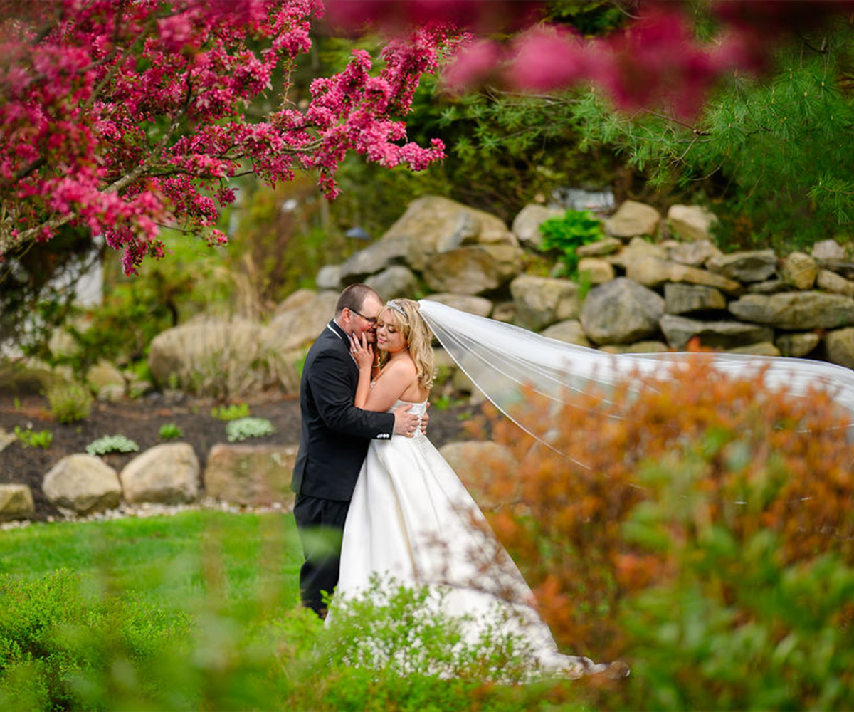 Couple among gardens at Miraval Gardens by Wedgewood Weddings