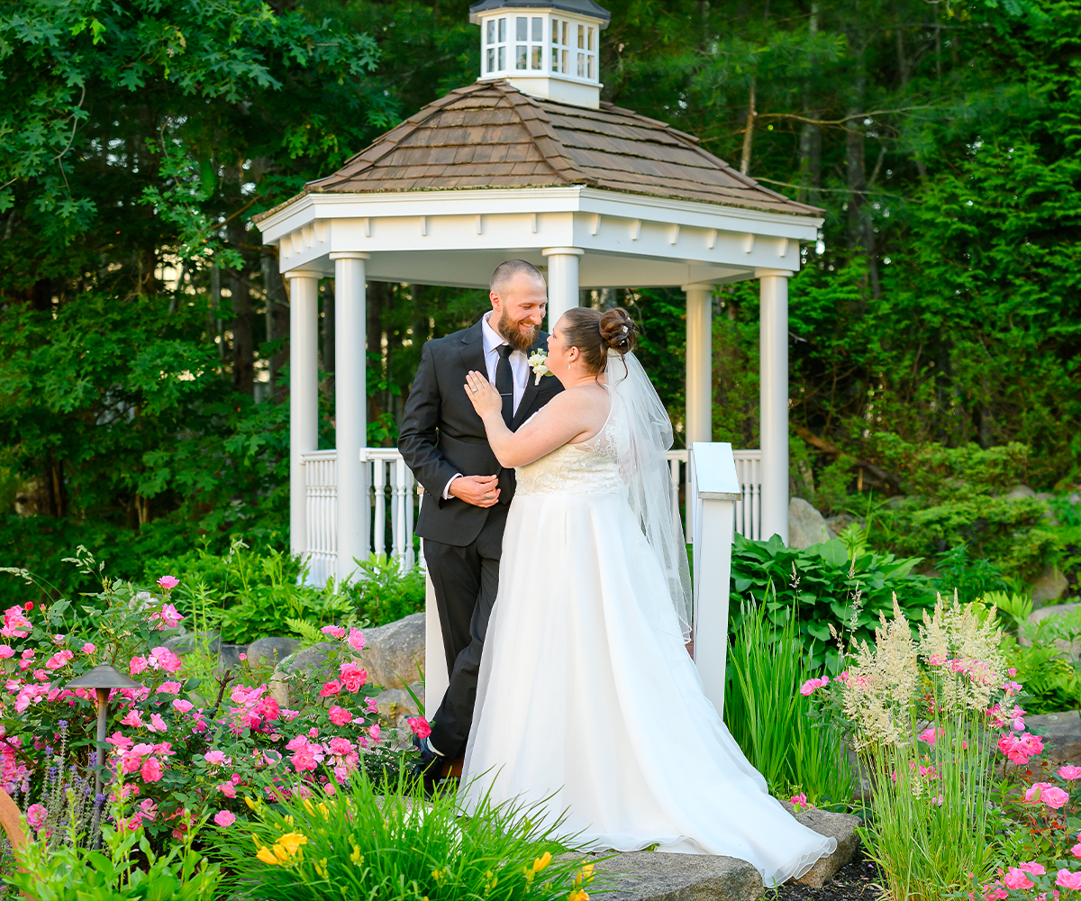 Couple posing in front of pergola - Miraval Gardens by Wedgewood Weddings