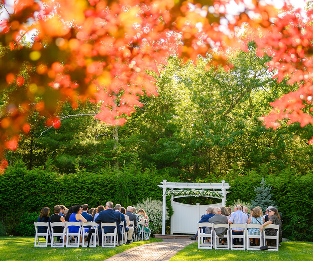 Lush ceremony site at Miraval Gardens by Wedgewood Weddings