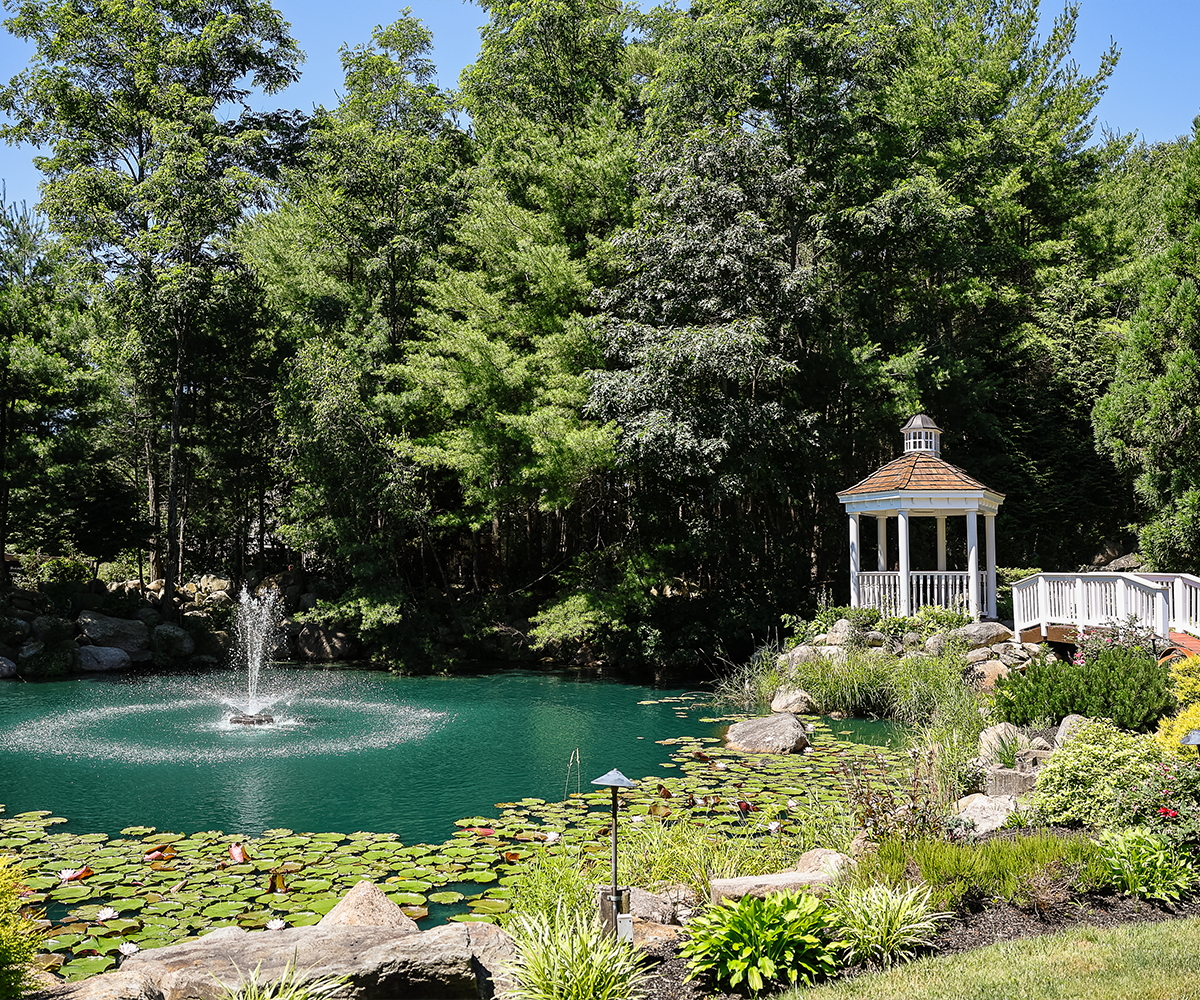 Peaceful pond and lush grounds at Miraval Gardens by Wedgewood Weddings