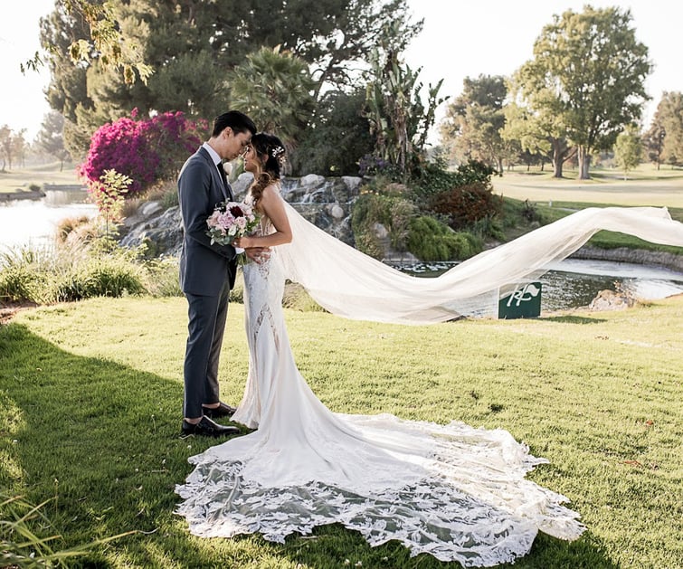 Photo op by pond at Rio Hondo by Wedgewood Weddings