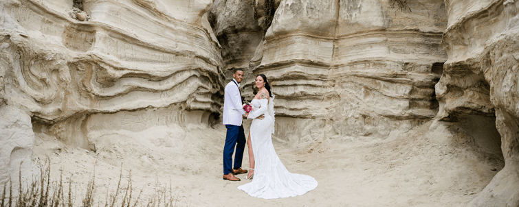 Bride and groom on the beach - San Clemente Shore by Wedgewood Weddings